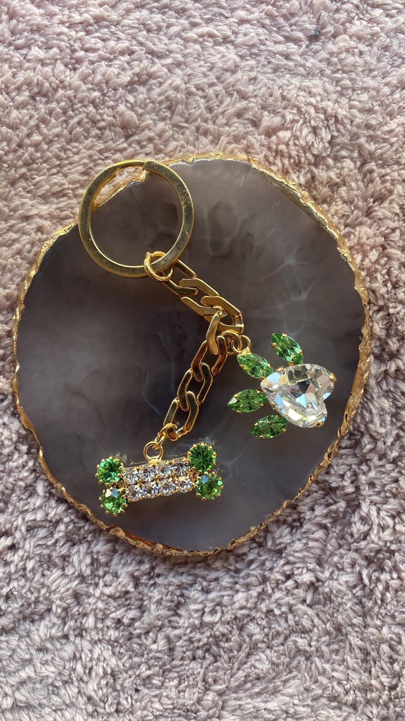 Portachiavi zampa ed osso Verde oro